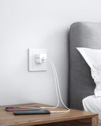 Anker charger with two smartphones for charging